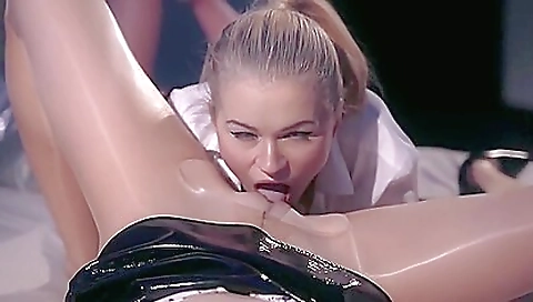 Two horny babes with a dildo and